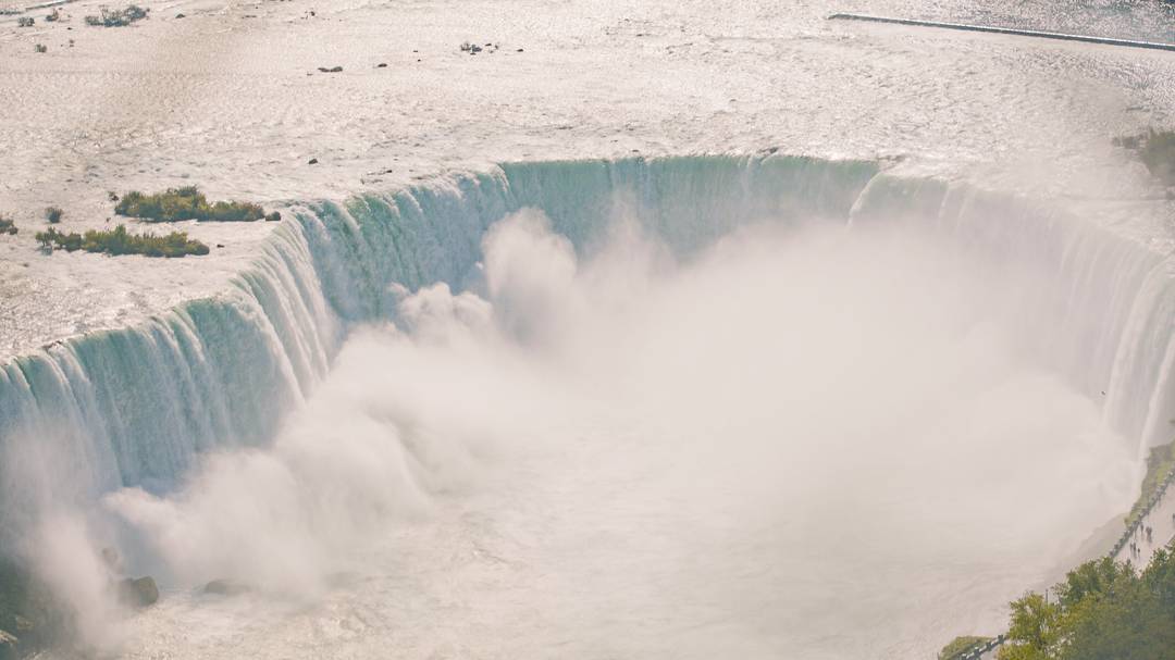 https://res.cloudinary.com/see-sight-tours/image/upload/v1581800000/niagara-falls-aerial.jpg